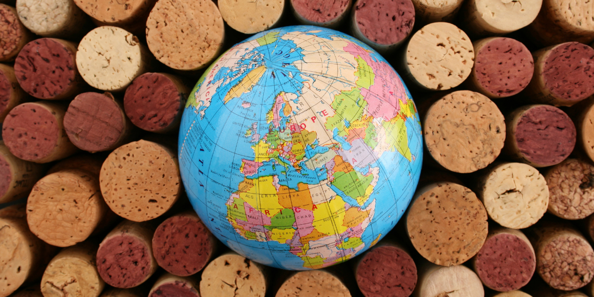 Small globe surrounded by wine corks